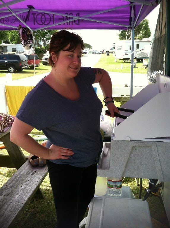 Woman Cooking outside Motorhome Rental